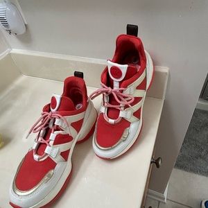 Red and white Michael Kors sneakers